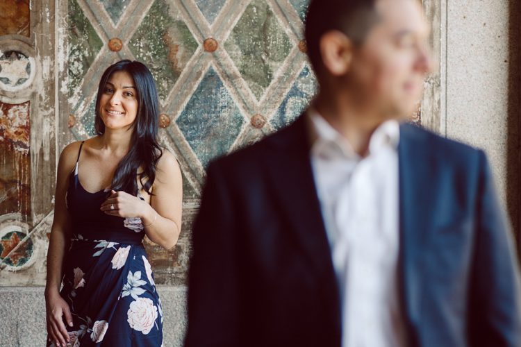 Bethesda Terrace Arcade in Central Park NY in my opinion alway so lovely. I saw Brianna and Joe standing in the middle of Bethesda Terrace next to the fountain. We walked right into the crowd of Central Park and started our engagement session. Cherry Blossoms were still in bloom along with all the spring blooms. Spring sun was brilliant and smiles on Brianna and Joe during the engagement session was so beautiful. Brianna and Joe's Bethesda Terrace Arcade in Central Park NY engagement session captured by NY NJ Weddings, Elopements and Family Photographer Karis.