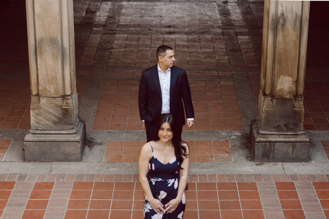 Bethesda Terrace Arcade in Central Park NY in my opinion alway so lovely. I saw Brianna and Joe standing in the middle of Bethesda Terrace next to the fountain. We walked right into the crowd of Central Park and started our engagement session. Cherry Blossoms were still in bloom along with all the spring blooms. Spring sun was brilliant and smiles on Brianna and Joe during the engagement session was so beautiful. Brianna and Joe's Bethesda Terrace Arcade in Central Park NY engagement session captured by NY NJ Weddings, Elopements and Family Photographer Karis.