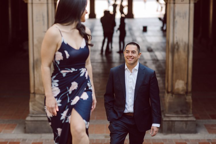 Bethesda Terrace Arcade in Central Park NY in my opinion alway so lovely. I saw Brianna and Joe standing in the middle of Bethesda Terrace next to the fountain. We walked right into the crowd of Central Park and started our engagement session. Cherry Blossoms were still in bloom along with all the spring blooms. Spring sun was brilliant and smiles on Brianna and Joe during the engagement session was so beautiful. Brianna and Joe's Bethesda Terrace Arcade in Central Park NY engagement session captured by NY NJ Weddings, Elopements and Family Photographer Karis.
