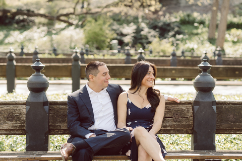 Bethesda Terrace Arcade in Central Park NY in my opinion alway so lovely. I saw Brianna and Joe standing in the middle of Bethesda Terrace next to the fountain. We walked right into the crowd of Central Park and started our engagement session. Cherry Blossoms were still in bloom along with all the spring blooms. Spring sun was brilliant and smiles on Brianna and Joe during the engagement session was so beautiful. Brianna and Joe's Bethesda Terrace Arcade in Central Park NY engagement session captured by NY NJ Weddings, Elopements and Family Photographer Karis.