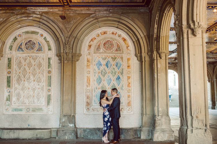 Bethesda Terrace Arcade in Central Park NY in my opinion alway so lovely. I saw Brianna and Joe standing in the middle of Bethesda Terrace next to the fountain. We walked right into the crowd of Central Park and started our engagement session. Cherry Blossoms were still in bloom along with all the spring blooms. Spring sun was brilliant and smiles on Brianna and Joe during the engagement session was so beautiful. Brianna and Joe's Bethesda Terrace Arcade in Central Park NY engagement session captured by NY NJ Weddings, Elopements and Family Photographer Karis.