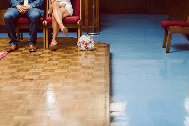 Colleen and Patrick had an intimate wedding ceremony at their church in Queens, NY then we went over to Gantry Plaza State Park LIC for their wedding photos. Colleen and Patrick's NYC elopement was nothing but fabulous and spectacle. When I saw all the food trucks lined up along Gantry Plaza State Park I knew I wanted to use it as our backdrop for Colleen and Patrick. Of course we chose "Mr Softee's Ice Truck" and as we were taking the photo one of Colleen and Patrick's cousin walked by doing the most epic photobomb ever! Colleen and Patrick's NYC elopement Gantry Plaza State Park LIC captured by NY NJ Weddings, Elopements and Family Photographer Karis by Hey Karis.