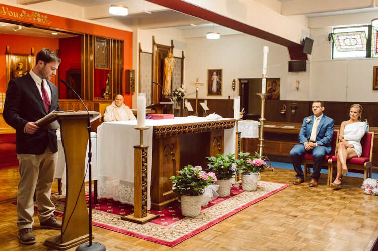 Colleen and Patrick had an intimate wedding ceremony at their church in Queens, NY then we went over to Gantry Plaza State Park LIC for their wedding photos. Colleen and Patrick's NYC elopement was nothing but fabulous and spectacle. When I saw all the food trucks lined up along Gantry Plaza State Park I knew I wanted to use it as our backdrop for Colleen and Patrick. Of course we chose "Mr Softee's Ice Truck" and as we were taking the photo one of Colleen and Patrick's cousin walked by doing the most epic photobomb ever! Colleen and Patrick's NYC elopement Gantry Plaza State Park LIC captured by NY NJ Weddings, Elopements and Family Photographer Karis by Hey Karis.
