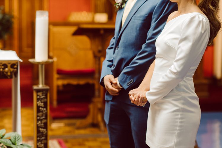 Colleen and Patrick had an intimate wedding ceremony at their church in Queens, NY then we went over to Gantry Plaza State Park LIC for their wedding photos. Colleen and Patrick's NYC elopement was nothing but fabulous and spectacle. When I saw all the food trucks lined up along Gantry Plaza State Park I knew I wanted to use it as our backdrop for Colleen and Patrick. Of course we chose "Mr Softee's Ice Truck" and as we were taking the photo one of Colleen and Patrick's cousin walked by doing the most epic photobomb ever! Colleen and Patrick's NYC elopement Gantry Plaza State Park LIC captured by NY NJ Weddings, Elopements and Family Photographer Karis by Hey Karis.