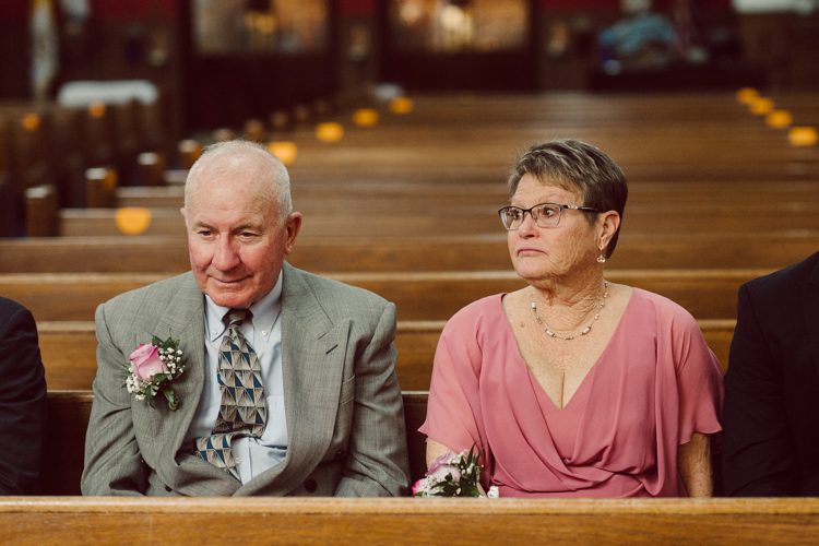 Colleen and Patrick had an intimate wedding ceremony at their church in Queens, NY then we went over to Gantry Plaza State Park LIC for their wedding photos. Colleen and Patrick's NYC elopement was nothing but fabulous and spectacle. When I saw all the food trucks lined up along Gantry Plaza State Park I knew I wanted to use it as our backdrop for Colleen and Patrick. Of course we chose "Mr Softee's Ice Truck" and as we were taking the photo one of Colleen and Patrick's cousin walked by doing the most epic photobomb ever! Colleen and Patrick's NYC elopement Gantry Plaza State Park LIC captured by NY NJ Weddings, Elopements and Family Photographer Karis by Hey Karis.