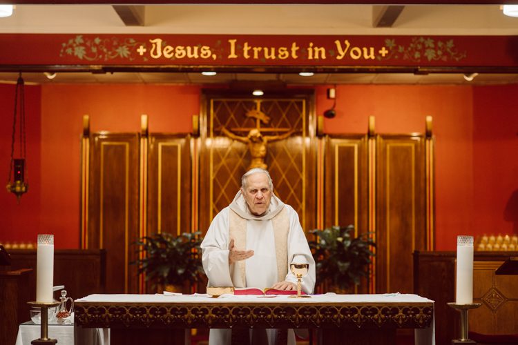 Colleen and Patrick had an intimate wedding ceremony at their church in Queens, NY then we went over to Gantry Plaza State Park LIC for their wedding photos. Colleen and Patrick's NYC elopement was nothing but fabulous and spectacle. When I saw all the food trucks lined up along Gantry Plaza State Park I knew I wanted to use it as our backdrop for Colleen and Patrick. Of course we chose "Mr Softee's Ice Truck" and as we were taking the photo one of Colleen and Patrick's cousin walked by doing the most epic photobomb ever! Colleen and Patrick's NYC elopement Gantry Plaza State Park LIC captured by NY NJ Weddings, Elopements and Family Photographer Karis by Hey Karis.