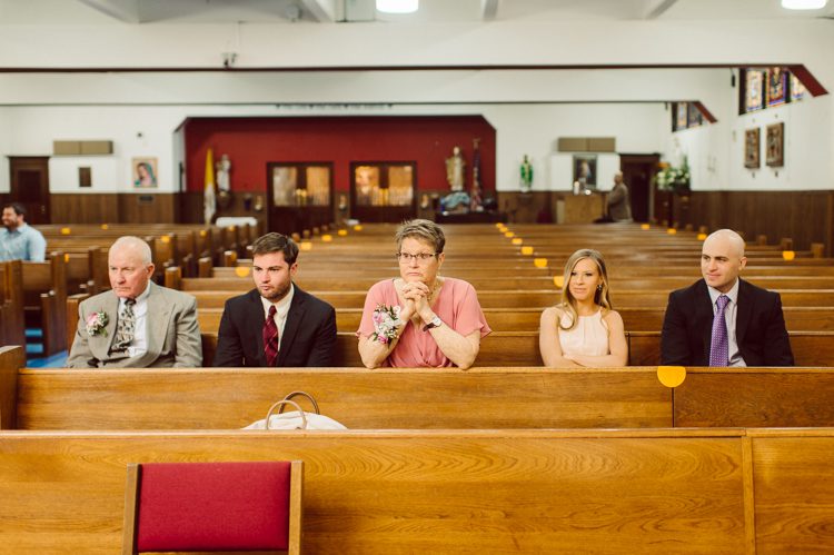 Colleen and Patrick had an intimate wedding ceremony at their church in Queens, NY then we went over to Gantry Plaza State Park LIC for their wedding photos. Colleen and Patrick's NYC elopement was nothing but fabulous and spectacle. When I saw all the food trucks lined up along Gantry Plaza State Park I knew I wanted to use it as our backdrop for Colleen and Patrick. Of course we chose "Mr Softee's Ice Truck" and as we were taking the photo one of Colleen and Patrick's cousin walked by doing the most epic photobomb ever! Colleen and Patrick's NYC elopement Gantry Plaza State Park LIC captured by NY NJ Weddings, Elopements and Family Photographer Karis by Hey Karis.