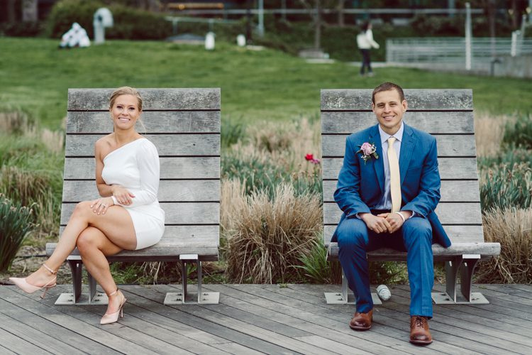 Colleen and Patrick had an intimate wedding ceremony at their church in Queens, NY then we went over to Gantry Plaza State Park LIC for their wedding photos. Colleen and Patrick's NYC elopement was nothing but fabulous and spectacle. When I saw all the food trucks lined up along Gantry Plaza State Park I knew I wanted to use it as our backdrop for Colleen and Patrick. Of course we chose "Mr Softee's Ice Truck" and as we were taking the photo one of Colleen and Patrick's cousin walked by doing the most epic photobomb ever! Colleen and Patrick's NYC elopement Gantry Plaza State Park LIC captured by NY NJ Weddings, Elopements and Family Photographer Karis by Hey Karis.
