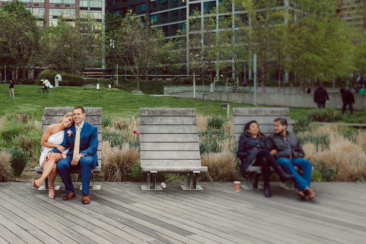 Colleen and Patrick had an intimate wedding ceremony at their church in Queens, NY then we went over to Gantry Plaza State Park LIC for their wedding photos. Colleen and Patrick's NYC elopement was nothing but fabulous and spectacle. When I saw all the food trucks lined up along Gantry Plaza State Park I knew I wanted to use it as our backdrop for Colleen and Patrick. Of course we chose "Mr Softee's Ice Truck" and as we were taking the photo one of Colleen and Patrick's cousin walked by doing the most epic photobomb ever! Colleen and Patrick's NYC elopement Gantry Plaza State Park LIC captured by NY NJ Weddings, Elopements and Family Photographer Karis by Hey Karis.