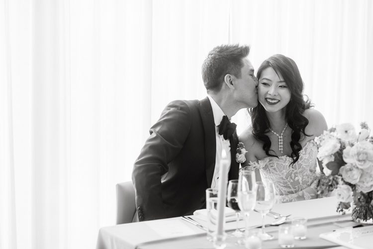 Public Hotel NYC spring rooftop wedding with Stella and Peter. NYC began to loosen COVID restrictions so events and weddings were finally allowed. Stella and Peter were able to keep their original wedding date, but unfortunately Stella's parents couldn't make it to the wedding due to COVID travel restrictions. Stella and Peter's wedding took place on 17th floor with rooftop access at the Public Hotel. Their wedding ceremony was on the rooftop, as well as their first look and some photos then we wandered around the hotel and took some epic photos at the pent house and escalator. Public Hotel NYC was so fun to photograph and I had the coolest, the most chill couple to work with. Stella and Peter's epic wedding at Public Hotel NYC photographed by Karis | Hey Karis.