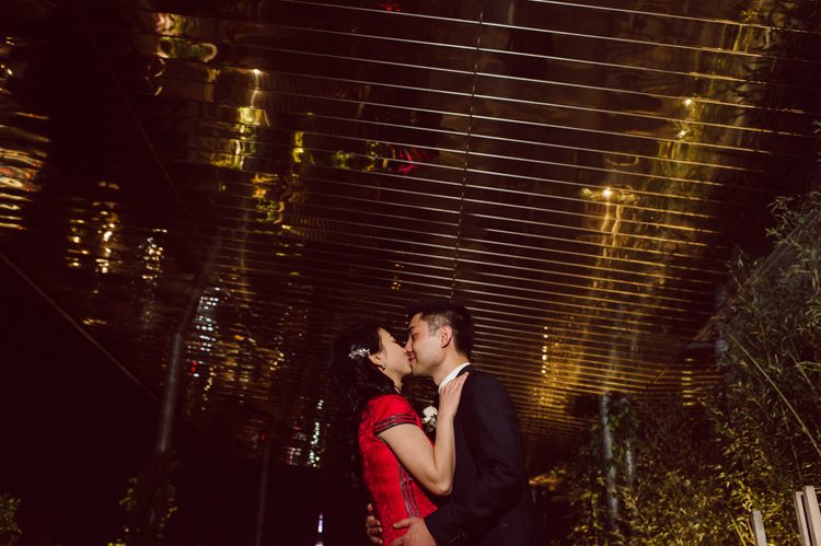 Public Hotel NYC spring rooftop wedding with Stella and Peter. NYC began to loosen COVID restrictions so events and weddings were finally allowed. Stella and Peter were able to keep their original wedding date, but unfortunately Stella's parents couldn't make it to the wedding due to COVID travel restrictions. Stella and Peter's wedding took place on 17th floor with rooftop access at the Public Hotel. Their wedding ceremony was on the rooftop, as well as their first look and some photos then we wandered around the hotel and took some epic photos at the pent house and escalator. Public Hotel NYC was so fun to photograph and I had the coolest, the most chill couple to work with. Stella and Peter's epic wedding at Public Hotel NYC photographed by Karis | Hey Karis.
