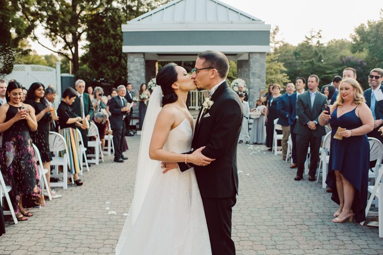 Two smart, corky and bubbly couple Christina and GP tied the knot at Bridgewater Manor. This doctor duo's very first priority while planning for their wedding was to create a safe wedding day for everyone. This "White Castle Burger" loving groom GP and sweet sweet Christina's wedding day was as I expected fun fun and fun. Their wedding day went smoothly, pleasantly and flawlessly. The whole day flew by because we were all having too much fun, I hope you'll relive the perfect moment through these photos.   NY NJ wedding and elopement photographer Karis, Hey Karis photographing Christina and GP's wedding at Bridgewater Manor, NJ. Christina and GP got ready at Hyatt House Bridgewater NJ, first look and wedding portraits took place at Leonard J Buck Gardens in the late afternoon. Christina and GP's outdoor wedding ceremony was right on time during gorgeous sunset at Bridgewater Manor. This beautiful smart doctor couple tied the knot with the most perfect sunset in front of their friends and family. These two then celebrated and partied the night away with smiles and dancing shoes. Bridgewater Manor NJ wedding photographed by Karis, NY NJ wedding and elopement photographer Hey Karis.