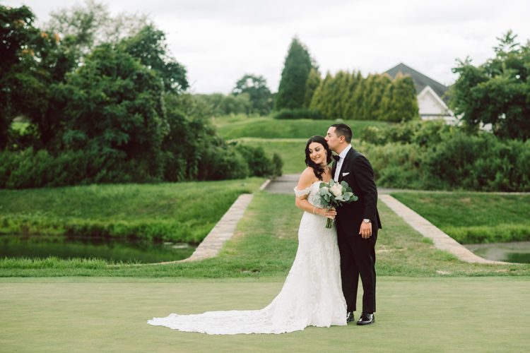 Brianna and Joe perfectly balances each other with their opposite personalities. Brianna quiet and calm and Joe loud and funny, they are the yin and yang to each other and together they create amazing chemistry. Joe's eyes literally sparkles when he is looking at her. Brianna and Joe's summer wedding at Trump National Golf Club Colts Neck NJ this past August was nothing but fun, filled with love and happy tears. Love is all we need in a wedding day! Brianna and Joe got married at ST. Mary’s Church in Colts Neck NJ then partied at Trump National Golf Club Colts Neck NJ. As soon as everyone was inside for the reception, the heavy grey clouds released a down pour washing the humidity away. Leaving cool evening for the newlyweds and their wedding guests to enjoy.  Brianna and Joe's wedding at Trump National Golf Club Colts Neck NJ photographed by Karis, NY NJ wedding and elopement photographer Hey Karis.