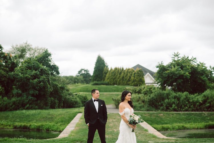 Brianna and Joe perfectly balances each other with their opposite personalities. Brianna quiet and calm and Joe loud and funny, they are the yin and yang to each other and together they create amazing chemistry. Joe's eyes literally sparkles when he is looking at her. Brianna and Joe's summer wedding at Trump National Golf Club Colts Neck NJ this past August was nothing but fun, filled with love and happy tears. Love is all we need in a wedding day! Brianna and Joe got married at ST. Mary’s Church in Colts Neck NJ then partied at Trump National Golf Club Colts Neck NJ. As soon as everyone was inside for the reception, the heavy grey clouds released a down pour washing the humidity away. Leaving cool evening for the newlyweds and their wedding guests to enjoy.  Brianna and Joe's wedding at Trump National Golf Club Colts Neck NJ photographed by Karis, NY NJ wedding and elopement photographer Hey Karis.