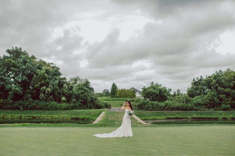 Brianna and Joe perfectly balances each other with their opposite personalities. Brianna quiet and calm and Joe loud and funny, they are the yin and yang to each other and together they create amazing chemistry. Joe's eyes literally sparkles when he is looking at her. Brianna and Joe's summer wedding at Trump National Golf Club Colts Neck NJ this past August was nothing but fun, filled with love and happy tears. Love is all we need in a wedding day! Brianna and Joe got married at ST. Mary’s Church in Colts Neck NJ then partied at Trump National Golf Club Colts Neck NJ. As soon as everyone was inside for the reception, the heavy grey clouds released a down pour washing the humidity away. Leaving cool evening for the newlyweds and their wedding guests to enjoy.  Brianna and Joe's wedding at Trump National Golf Club Colts Neck NJ photographed by Karis, NY NJ wedding and elopement photographer Hey Karis.