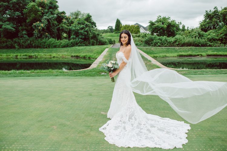 Brianna and Joe perfectly balances each other with their opposite personalities. Brianna quiet and calm and Joe loud and funny, they are the yin and yang to each other and together they create amazing chemistry. Joe's eyes literally sparkles when he is looking at her. Brianna and Joe's summer wedding at Trump National Golf Club Colts Neck NJ this past August was nothing but fun, filled with love and happy tears. Love is all we need in a wedding day! Brianna and Joe got married at ST. Mary’s Church in Colts Neck NJ then partied at Trump National Golf Club Colts Neck NJ. As soon as everyone was inside for the reception, the heavy grey clouds released a down pour washing the humidity away. Leaving cool evening for the newlyweds and their wedding guests to enjoy.  Brianna and Joe's wedding at Trump National Golf Club Colts Neck NJ photographed by Karis, NY NJ wedding and elopement photographer Hey Karis.