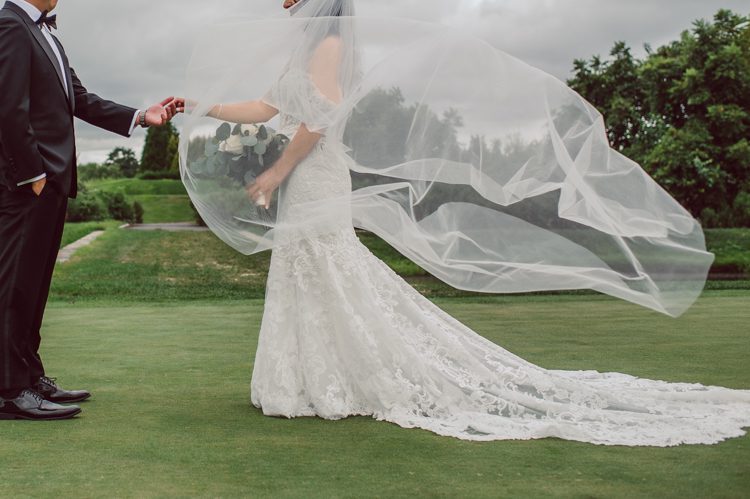 Brianna and Joe perfectly balances each other with their opposite personalities. Brianna quiet and calm and Joe loud and funny, they are the yin and yang to each other and together they create amazing chemistry. Joe's eyes literally sparkles when he is looking at her. Brianna and Joe's summer wedding at Trump National Golf Club Colts Neck NJ this past August was nothing but fun, filled with love and happy tears. Love is all we need in a wedding day! Brianna and Joe got married at ST. Mary’s Church in Colts Neck NJ then partied at Trump National Golf Club Colts Neck NJ. As soon as everyone was inside for the reception, the heavy grey clouds released a down pour washing the humidity away. Leaving cool evening for the newlyweds and their wedding guests to enjoy.  Brianna and Joe's wedding at Trump National Golf Club Colts Neck NJ photographed by Karis, NY NJ wedding and elopement photographer Hey Karis.