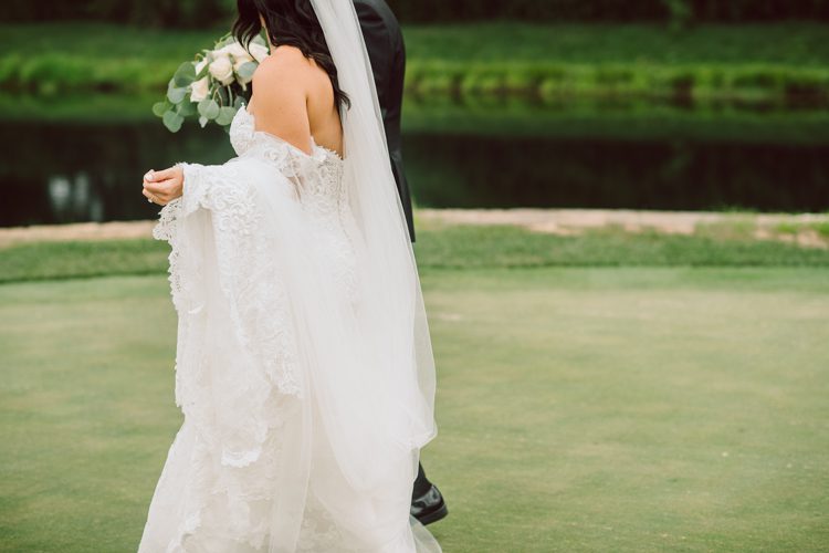 Brianna and Joe perfectly balances each other with their opposite personalities. Brianna quiet and calm and Joe loud and funny, they are the yin and yang to each other and together they create amazing chemistry. Joe's eyes literally sparkles when he is looking at her. Brianna and Joe's summer wedding at Trump National Golf Club Colts Neck NJ this past August was nothing but fun, filled with love and happy tears. Love is all we need in a wedding day! Brianna and Joe got married at ST. Mary’s Church in Colts Neck NJ then partied at Trump National Golf Club Colts Neck NJ. As soon as everyone was inside for the reception, the heavy grey clouds released a down pour washing the humidity away. Leaving cool evening for the newlyweds and their wedding guests to enjoy.  Brianna and Joe's wedding at Trump National Golf Club Colts Neck NJ photographed by Karis, NY NJ wedding and elopement photographer Hey Karis.