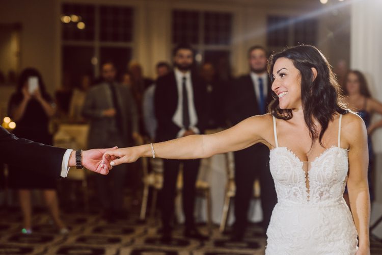 Brianna and Joe perfectly balances each other with their opposite personalities. Brianna quiet and calm and Joe loud and funny, they are the yin and yang to each other and together they create amazing chemistry. Joe's eyes literally sparkles when he is looking at her. Brianna and Joe's summer wedding at Trump National Golf Club Colts Neck NJ this past August was nothing but fun, filled with love and happy tears. Love is all we need in a wedding day! Brianna and Joe got married at ST. Mary’s Church in Colts Neck NJ then partied at Trump National Golf Club Colts Neck NJ. As soon as everyone was inside for the reception, the heavy grey clouds released a down pour washing the humidity away. Leaving cool evening for the newlyweds and their wedding guests to enjoy.  Brianna and Joe's wedding at Trump National Golf Club Colts Neck NJ photographed by Karis, NY NJ wedding and elopement photographer Hey Karis.