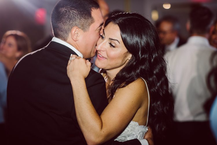 Brianna and Joe perfectly balances each other with their opposite personalities. Brianna quiet and calm and Joe loud and funny, they are the yin and yang to each other and together they create amazing chemistry. Joe's eyes literally sparkles when he is looking at her. Brianna and Joe's summer wedding at Trump National Golf Club Colts Neck NJ this past August was nothing but fun, filled with love and happy tears. Love is all we need in a wedding day! Brianna and Joe got married at ST. Mary’s Church in Colts Neck NJ then partied at Trump National Golf Club Colts Neck NJ. As soon as everyone was inside for the reception, the heavy grey clouds released a down pour washing the humidity away. Leaving cool evening for the newlyweds and their wedding guests to enjoy.  Brianna and Joe's wedding at Trump National Golf Club Colts Neck NJ photographed by Karis, NY NJ wedding and elopement photographer Hey Karis.