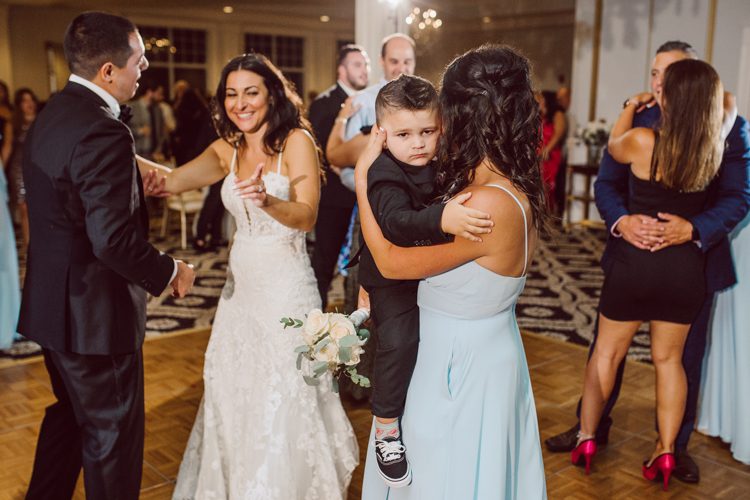 Brianna and Joe perfectly balances each other with their opposite personalities. Brianna quiet and calm and Joe loud and funny, they are the yin and yang to each other and together they create amazing chemistry. Joe's eyes literally sparkles when he is looking at her. Brianna and Joe's summer wedding at Trump National Golf Club Colts Neck NJ this past August was nothing but fun, filled with love and happy tears. Love is all we need in a wedding day! Brianna and Joe got married at ST. Mary’s Church in Colts Neck NJ then partied at Trump National Golf Club Colts Neck NJ. As soon as everyone was inside for the reception, the heavy grey clouds released a down pour washing the humidity away. Leaving cool evening for the newlyweds and their wedding guests to enjoy.  Brianna and Joe's wedding at Trump National Golf Club Colts Neck NJ photographed by Karis, NY NJ wedding and elopement photographer Hey Karis.