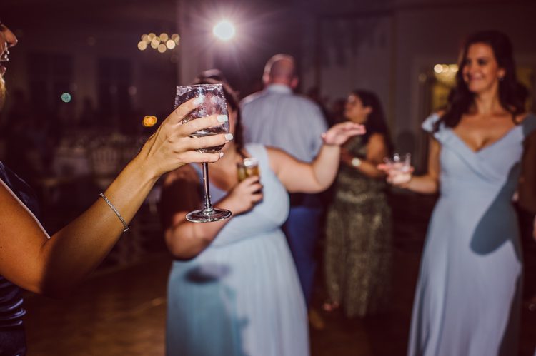 Brianna and Joe perfectly balances each other with their opposite personalities. Brianna quiet and calm and Joe loud and funny, they are the yin and yang to each other and together they create amazing chemistry. Joe's eyes literally sparkles when he is looking at her. Brianna and Joe's summer wedding at Trump National Golf Club Colts Neck NJ this past August was nothing but fun, filled with love and happy tears. Love is all we need in a wedding day! Brianna and Joe got married at ST. Mary’s Church in Colts Neck NJ then partied at Trump National Golf Club Colts Neck NJ. As soon as everyone was inside for the reception, the heavy grey clouds released a down pour washing the humidity away. Leaving cool evening for the newlyweds and their wedding guests to enjoy.  Brianna and Joe's wedding at Trump National Golf Club Colts Neck NJ photographed by Karis, NY NJ wedding and elopement photographer Hey Karis.