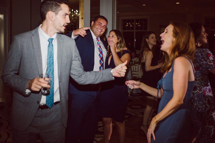 Brianna and Joe perfectly balances each other with their opposite personalities. Brianna quiet and calm and Joe loud and funny, they are the yin and yang to each other and together they create amazing chemistry. Joe's eyes literally sparkles when he is looking at her. Brianna and Joe's summer wedding at Trump National Golf Club Colts Neck NJ this past August was nothing but fun, filled with love and happy tears. Love is all we need in a wedding day! Brianna and Joe got married at ST. Mary’s Church in Colts Neck NJ then partied at Trump National Golf Club Colts Neck NJ. As soon as everyone was inside for the reception, the heavy grey clouds released a down pour washing the humidity away. Leaving cool evening for the newlyweds and their wedding guests to enjoy.  Brianna and Joe's wedding at Trump National Golf Club Colts Neck NJ photographed by Karis, NY NJ wedding and elopement photographer Hey Karis.