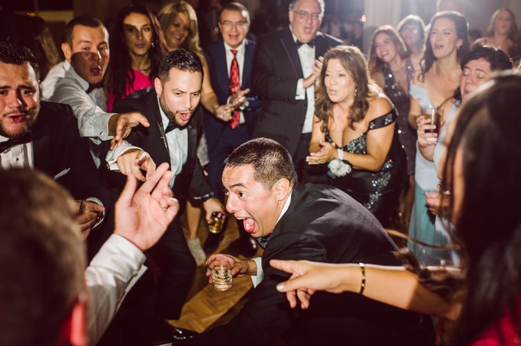 Brianna and Joe perfectly balances each other with their opposite personalities. Brianna quiet and calm and Joe loud and funny, they are the yin and yang to each other and together they create amazing chemistry. Joe's eyes literally sparkles when he is looking at her. Brianna and Joe's summer wedding at Trump National Golf Club Colts Neck NJ this past August was nothing but fun, filled with love and happy tears. Love is all we need in a wedding day! Brianna and Joe got married at ST. Mary’s Church in Colts Neck NJ then partied at Trump National Golf Club Colts Neck NJ. As soon as everyone was inside for the reception, the heavy grey clouds released a down pour washing the humidity away. Leaving cool evening for the newlyweds and their wedding guests to enjoy.  Brianna and Joe's wedding at Trump National Golf Club Colts Neck NJ photographed by Karis, NY NJ wedding and elopement photographer Hey Karis.
