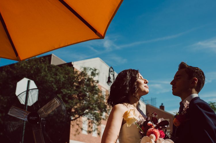 Mr. C Seaport NYC elopement was too fabulous. When Samantha inquired about her intimate NYC elopement at Mr. C Seaport with less than 10 people I was way to excited. I love photographing intimate small weddings and elopements because they can only be real, 1000% filled with love, true emotions and I get to be part of this very intimate celebration to tell their love story. Samantha and Dan's Mr. C Seaport small ceremony was held on the terrace, then we took quick family photos with their parents and siblings followed by wandering around historic and iconic South Street Seaport to get some iconic South Street Seaport wedding photos of Samantha and Dan. Samantha and Dan's Mr. C Seaport Elopement photographed by NYC elopement, Huson Valley, Catskills, NY and NJ Farm, Adventure Wedding and Elopement Photographer Karis | Hey Karis