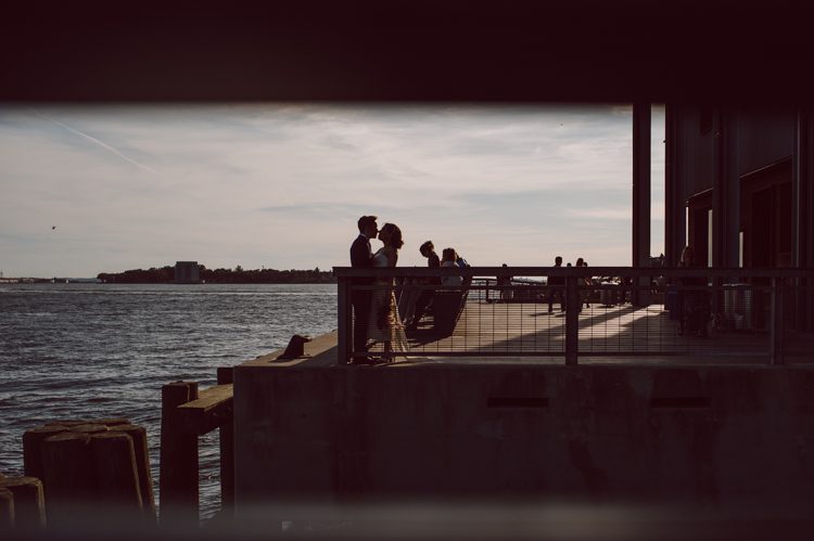 Mr. C Seaport NYC elopement was too fabulous. When Samantha inquired about her intimate NYC elopement at Mr. C Seaport with less than 10 people I was way to excited. I love photographing intimate small weddings and elopements because they can only be real, 1000% filled with love, true emotions and I get to be part of this very intimate celebration to tell their love story. Samantha and Dan's Mr. C Seaport small ceremony was held on the terrace, then we took quick family photos with their parents and siblings followed by wandering around historic and iconic South Street Seaport to get some iconic South Street Seaport wedding photos of Samantha and Dan. Samantha and Dan's Mr. C Seaport Elopement photographed by NYC elopement, Huson Valley, Catskills, NY and NJ Farm, Adventure Wedding and Elopement Photographer Karis | Hey Karis 