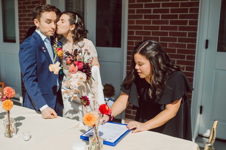 Mr. C Seaport NYC elopement was too fabulous. When Samantha inquired about her intimate NYC elopement at Mr. C Seaport with less than 10 people I was way to excited. I love photographing intimate small weddings and elopements because they can only be real, 1000% filled with love, true emotions and I get to be part of this very intimate celebration to tell their love story. Samantha and Dan's Mr. C Seaport small ceremony was held on the terrace, then we took quick family photos with their parents and siblings followed by wandering around historic and iconic South Street Seaport to get some iconic South Street Seaport wedding photos of Samantha and Dan. Samantha and Dan's Mr. C Seaport Elopement photographed by NYC elopement, Huson Valley, Catskills, NY and NJ Farm, Adventure Wedding and Elopement Photographer Karis | Hey Karis
