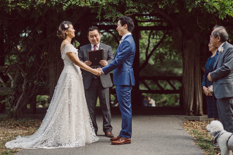 Monica and Will had a very simple intimate elopement planned at Central Park, NY then little reception with friends and parents are Instagram famous "Prince Tea House". Monica and Will's first look took place by Bethesda Fountain along with their beloved pup Appa (white fluffy Bichon Frise) We walked around Bethesda Fountain/Arcade getting some wedding portraits for Monica, Will and Appa then we walked towards Cop-Cot Central Park for Monica and Will's super intimate wedding ceremony officiated by his brother and joined by their parents, siblings and one friend. This super mini wedding ceremony was straight to the point and quick! At Prince Tea House about 20-30 friends of Monica and Will joined to celebrate the newly weds over some tea, biscuits and sandwiches. Monica and Will's Cop-Cot Central Park elopement, Prince Tea House wedding reception photographed by NYC elopement, Hudson Valley, Catskills, NY and NJ Farm, Adventure Wedding and Elopement Photographer Karis | Hey Karis