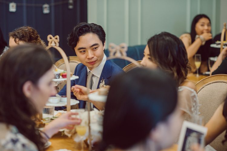 Monica and Will had a very simple intimate elopement planned at Central Park, NY then little reception with friends and parents are Instagram famous "Prince Tea House". Monica and Will's first look took place by Bethesda Fountain along with their beloved pup Appa (white fluffy Bichon Frise) We walked around Bethesda Fountain/Arcade getting some wedding portraits for Monica, Will and Appa then we walked towards Cop-Cot Central Park for Monica and Will's super intimate wedding ceremony officiated by his brother and joined by their parents, siblings and one friend. This super mini wedding ceremony was straight to the point and quick! At Prince Tea House about 20-30 friends of Monica and Will joined to celebrate the newly weds over some tea, biscuits and sandwiches. Monica and Will's Cop-Cot Central Park elopement, Prince Tea House wedding reception photographed by NYC elopement, Hudson Valley, Catskills, NY and NJ Farm, Adventure Wedding and Elopement Photographer Karis | Hey Karis