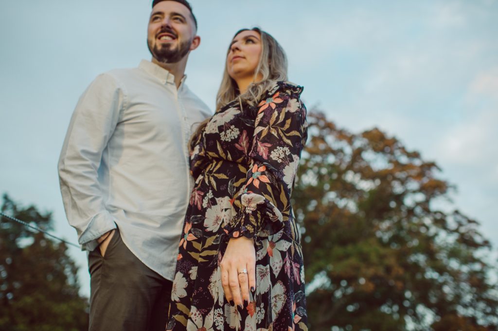 Samantha and Mike met while attending Monmouth University in West Long Branch, NJ. Sam and Mike's relationship wasn't a romantic one in the beginning but slowly they felt love for each other and one perfect day they became a couple. For their Fall engagement session, Sam and Mike decided to visit their old campus for their engagement session where it all began for them. Sam and Mike's Monmouth University Engagement photographed by NYC elopement, Hudson Valley, Catskills, NY and NJ, Farm, Adventure Wedding and Elopement Photographer Karis | Hey Karis