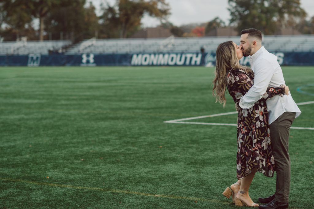 Samantha and Mike met while attending Monmouth University in West Long Branch, NJ. Sam and Mike's relationship wasn't a romantic one in the beginning but slowly they felt love for each other and one perfect day they became a couple. For their Fall engagement session, Sam and Mike decided to visit their old campus for their engagement session where it all began for them. Sam and Mike's Monmouth University Engagement photographed by NYC elopement, Hudson Valley, Catskills, NY and NJ, Farm, Adventure Wedding and Elopement Photographer Karis | Hey Karis