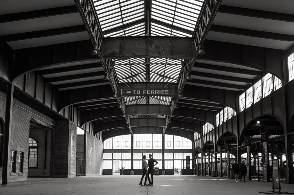 Jackie and Aron moved to the NYC from Hoboken and Jersey City area. And remembered loving the view of NYC from Liberty State Park so we chose Liberty State Park for their engagement session. It was one of the colder day in November but Jackie and Aron took the cold breeze like a champ and we created some rocking engagement photos. Jackie and Aron's Liberty State Park Jersey City NJ photographed by Hudson Valley, Catskills, NYC and NJ, Fun Wedding and Intimate Elopement Photographer | Hey Karis.