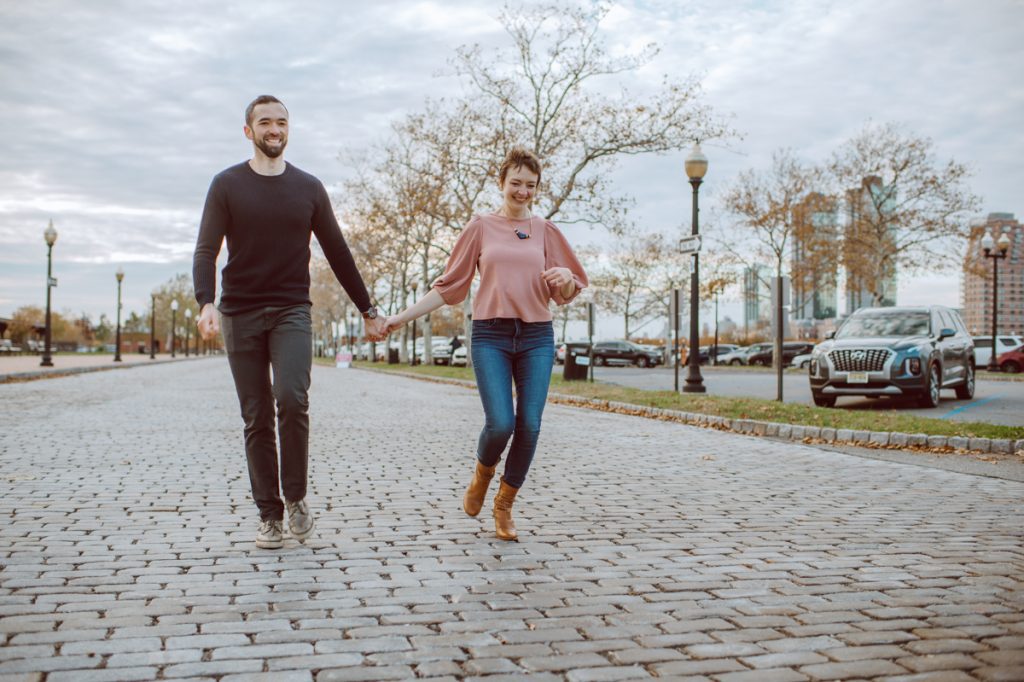 Jackie and Aron moved to the NYC from Hoboken and Jersey City area. And remembered loving the view of NYC from Liberty State Park so we chose Liberty State Park for their engagement session. It was one of the colder day in November but Jackie and Aron took the cold breeze like a champ and we created some rocking engagement photos. Jackie and Aron's Liberty State Park Jersey City NJ photographed by Hudson Valley, Catskills, NYC and NJ, Fun Wedding and Intimate Elopement Photographer | Hey Karis.