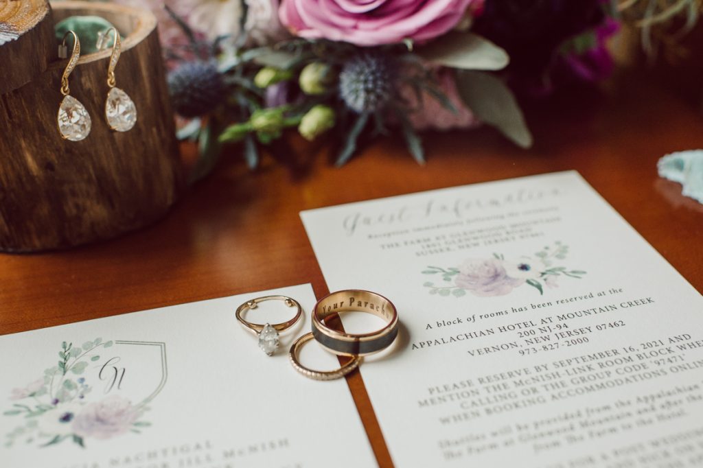 The Farm at Glenwood Mountain located in Sussex, NJ right by Mountain Creek Resort, this unique farm wedding venue was on my bucket list and I had the chance to photograph a wedding here with the best couple! Cristina and Nick, rock'n roll loving die hard fan of Marvel Studio duo celebrated their love and becoming one union at The Farm at Glenwood Mountain with fluffy cows in their backdrop. Cristina and Nick's love for each other is so real and true brought tears and smile on my eye and face the entire day. Cristina and Nick's The Farm and Glenwood Mountain wedding photographed by Hudson Valley, Catskills, NYC and NJ, Fun Wedding and Intimate Elopement Photographer | Hey Karis.
