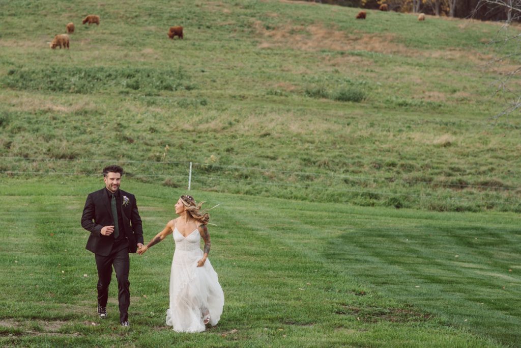The Farm at Glenwood Mountain located in Sussex, NJ right by Mountain Creek Resort, this unique farm wedding venue was on my bucket list and I had the chance to photograph a wedding here with the best couple! Cristina and Nick, rock'n roll loving die hard fan of Marvel Studio duo celebrated their love and becoming one union at The Farm at Glenwood Mountain with fluffy cows in their backdrop. Cristina and Nick's love for each other is so real and true brought tears and smile on my eye and face the entire day. Cristina and Nick's The Farm and Glenwood Mountain wedding photographed by Hudson Valley, Catskills, NYC and NJ, Fun Wedding and Intimate Elopement Photographer | Hey Karis.