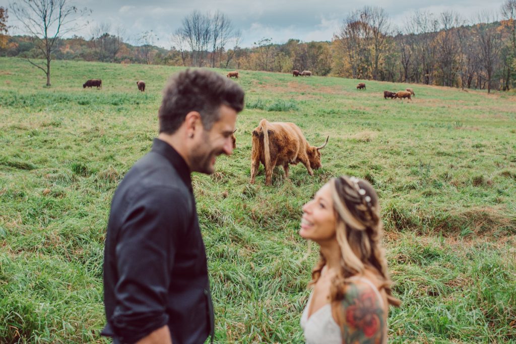 The Farm at Glenwood Mountain located in Sussex, NJ right by Mountain Creek Resort, this unique farm wedding venue was on my bucket list and I had the chance to photograph a wedding here with the best couple! Cristina and Nick, rock'n roll loving die hard fan of Marvel Studio duo celebrated their love and becoming one union at The Farm at Glenwood Mountain with fluffy cows in their backdrop. Cristina and Nick's love for each other is so real and true brought tears and smile on my eye and face the entire day. Cristina and Nick's The Farm and Glenwood Mountain wedding photographed by Hudson Valley, Catskills, NYC and NJ, Fun Wedding and Intimate Elopement Photographer | Hey Karis.