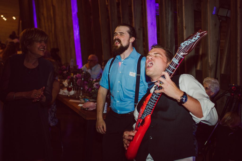 The Farm at Glenwood Mountain located in Sussex, NJ right by Mountain Creek Resort, this unique farm wedding venue was on my bucket list and I had the chance to photograph a wedding here with the best couple! Cristina and Nick, rock'n roll loving die hard fan of Marvel Studio duo celebrated their love and becoming one union at The Farm at Glenwood Mountain with fluffy cows in their backdrop. Cristina and Nick's love for each other is so real and true brought tears and smile on my eye and face the entire day. Cristina and Nick's The Farm and Glenwood Mountain wedding photographed by Hudson Valley, Catskills, NYC and NJ, Fun Wedding and Intimate Elopement Photographer | Hey Karis.