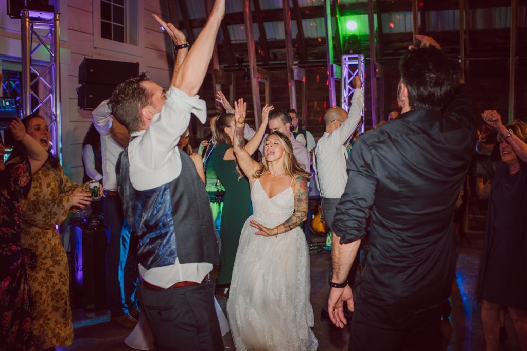 The Farm at Glenwood Mountain located in Sussex, NJ right by Mountain Creek Resort, this unique farm wedding venue was on my bucket list and I had the chance to photograph a wedding here with the best couple! Cristina and Nick, rock'n roll loving die hard fan of Marvel Studio duo celebrated their love and becoming one union at The Farm at Glenwood Mountain with fluffy cows in their backdrop. Cristina and Nick's love for each other is so real and true brought tears and smile on my eye and face the entire day. Cristina and Nick's The Farm and Glenwood Mountain wedding photographed by Hudson Valley, Catskills, NYC and NJ, Fun Wedding and Intimate Elopement Photographer | Hey Karis.