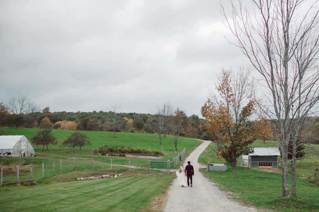 The Farm at Glenwood Mountain located in Sussex, NJ right by Mountain Creek Resort, this unique farm wedding venue was on my bucket list and I had the chance to photograph a wedding here with the best couple! Cristina and Nick, rock'n roll loving die hard fan of Marvel Studio duo celebrated their love and becoming one union at The Farm at Glenwood Mountain with fluffy cows in their backdrop. Cristina and Nick's love for each other is so real and true brought tears and smile on my eye and face the entire day. Cristina and Nick's The Farm and Glenwood Mountain wedding photographed by Hudson Valley, Catskills, NYC and NJ, Fun Wedding and Intimate Elopement Photographer | Hey Karis.