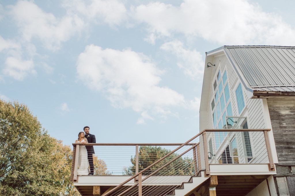 The Farm at Glenwood Mountain located in Sussex, NJ right by Mountain Creek Resort, this unique farm wedding venue was on my bucket list and I had the chance to photograph a wedding here with the best couple! Cristina and Nick, rock'n roll loving die hard fan of Marvel Studio duo celebrated their love and becoming one union at The Farm at Glenwood Mountain with fluffy cows in their backdrop. Cristina and Nick's love for each other is so real and true brought tears and smile on my eye and face the entire day. Cristina and Nick's The Farm and Glenwood Mountain wedding photographed by Hudson Valley, Catskills, NYC and NJ, Fun Wedding and Intimate Elopement Photographer | Hey Karis.
