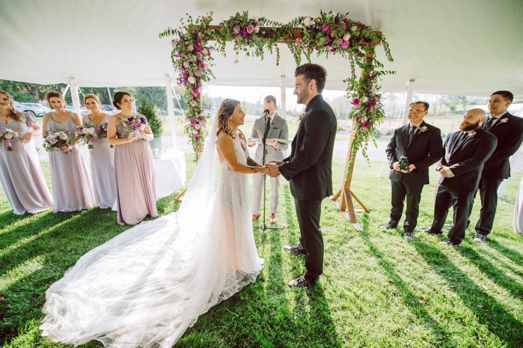 The Farm at Glenwood Mountain located in Sussex, NJ right by Mountain Creek Resort, this unique farm wedding venue was on my bucket list and I had the chance to photograph a wedding here with the best couple! Cristina and Nick, rock'n roll loving die hard fan of Marvel Studio duo celebrated their love and becoming one union at The Farm at Glenwood Mountain with fluffy cows in their backdrop. Cristina and Nick's love for each other is so real and true brought tears and smile on my eye and face the entire day. Cristina and Nick's The Farm and Glenwood Mountain wedding photographed by Hudson Valley, Catskills, NYC and NJ, Fun Wedding and Intimate Elopement Photographer | Hey Karis.