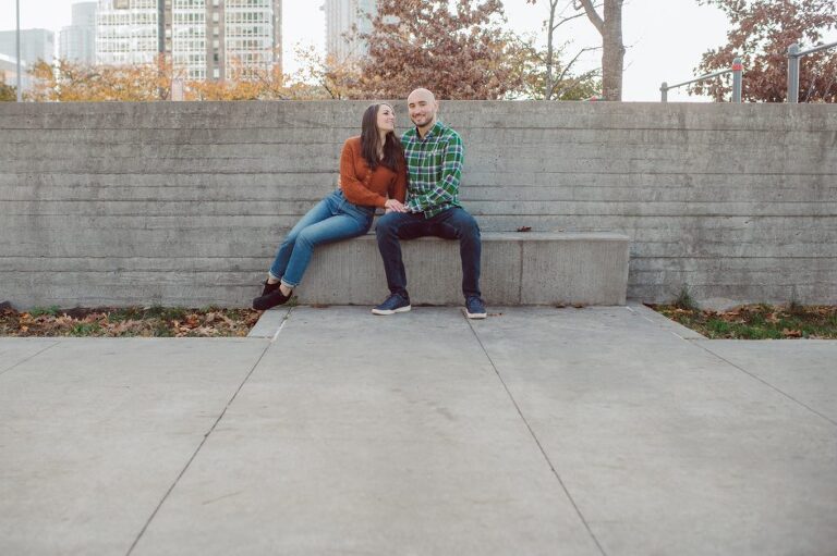 The fun I had meeting Wilson, Melanie and Calvin's Golden Doodle pup I had the pleasure of meeting for their engagement session at Gantry Plaza State Park LIC. Melanie and Calvin lives right by the Gantry Plaza State Park so naturally we chose to meet here for their engagement session, plus we had to make it easy for their fur baby Wilson to join. Wilson of course stole all my attention for the first half of the engagement session then Wilson was walked by Melanie and Calvin's friend while we wandered off the explore other parts of Gantry Plaza State Park. Melanie and Calvin's Fall engagement session at Gantry Plaza State Park LIC joined by their golden doodle Wilson  photographed by Hudson Valley, Catskills, NYC and NJ, Fun Weddings and Intimate Elopements Photographer | Hey Karis.