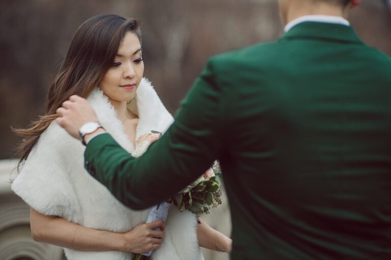 Raymond reached out to me about a month ago regarding his elopement plans at Central Park, NY. Specifically on the Bow Bridge Central Park, NY. His original elopement plan only included his finace and himself plus the officiant but as all wedding plans go they ended up adding their parents and family to the celebration. Rose and Raymond's Central Park NY elopement started bit rainy and gloomy but rain stopped right on time for Rose and Raymond's Bow Bridge elopement. Then we walked around Bethesda Fountain and Bethesda Arcade for some wedding portraits. Rose and Raymond braved the chilly almost freezing NYC weather during the portrait time and we were able to get some amazing photos at Central Park. Rose and Raymond's Central Park NY Elopement photographed by Hudson Valley, Catskills, NYC and NJ, Fun Weddings and Intimate Elopements Photographer | Hey Karis.