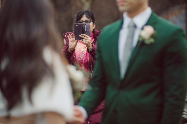 Raymond reached out to me about a month ago regarding his elopement plans at Central Park, NY. Specifically on the Bow Bridge Central Park, NY. His original elopement plan only included his finace and himself plus the officiant but as all wedding plans go they ended up adding their parents and family to the celebration. Rose and Raymond's Central Park NY elopement started bit rainy and gloomy but rain stopped right on time for Rose and Raymond's Bow Bridge elopement. Then we walked around Bethesda Fountain and Bethesda Arcade for some wedding portraits. Rose and Raymond braved the chilly almost freezing NYC weather during the portrait time and we were able to get some amazing photos at Central Park. Rose and Raymond's Central Park NY Elopement photographed by Hudson Valley, Catskills, NYC and NJ, Fun Weddings and Intimate Elopements Photographer | Hey Karis.