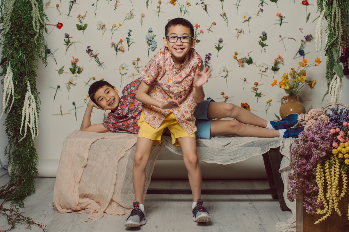 My studio spring mini set up is done and looking very fabulous. As launching of my studio and my very first studio spring mini session I've gotten my own family all dressed up in spring floral outfits and got them in front of the camera here at my studio in Plainfield, NJ. This studio photo session was extra joyful and special because it was joined by my parents, my two boys, my husband and our dog Elly! We laughed and looked at each other faces, stood and sat next to each other holding hands was a very successful first Studio Spring Mini here at Hey Karis' Studio Spring Mini. Come join me at my studio in Plainfield, NJ for floral spring mini session or for editorial portrait, family studio session.