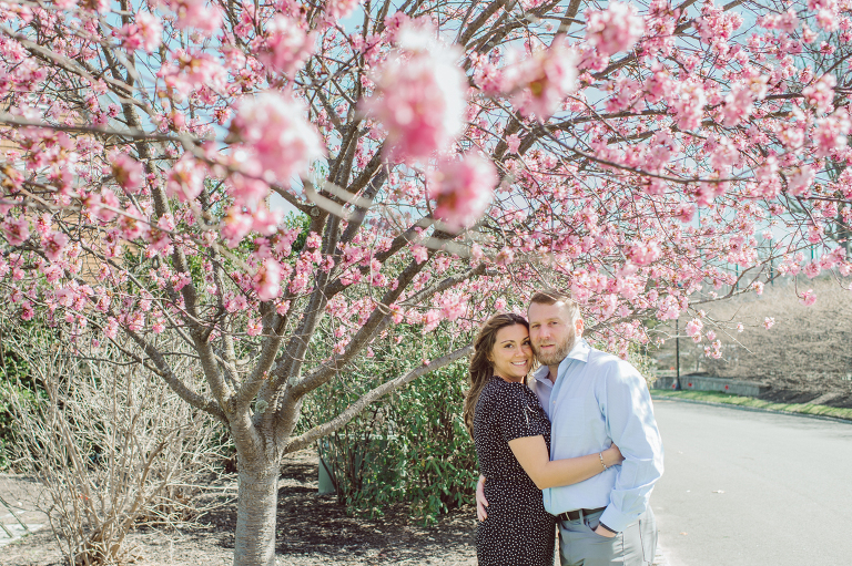 Spring engagement session with Faith and Joseph at Canoe Brook Country Club, NJ. Faith & Joseph's bridal shower was being hosted at Canoe Brook Country Club so we met earlier at Canoe Brook Country Club to meet, hang out and get some camera time with me before their wedding at Park Chateau end of May. We even wrapped up the session with beautiful pink cherry trees that was lined at the entrance to Canoe Brook Country Club. Faith and Joseph's Canoe Brook Country Club, NJ engagement by Karis. Hey Karis is Hudson Valley, Garrison NY and NJ, Fun Weddings and Intimate Elopements Photographer.